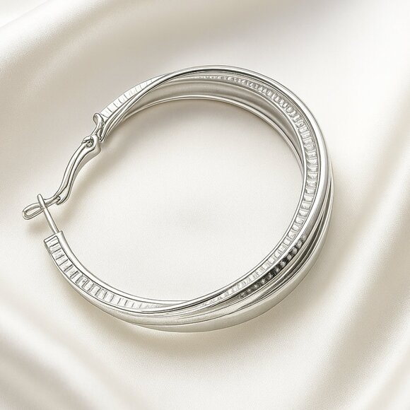 Polished Silver Ribbed Twist Hoop Earrings – Classic Textured Statement Jewelry - Picture 1 of 10